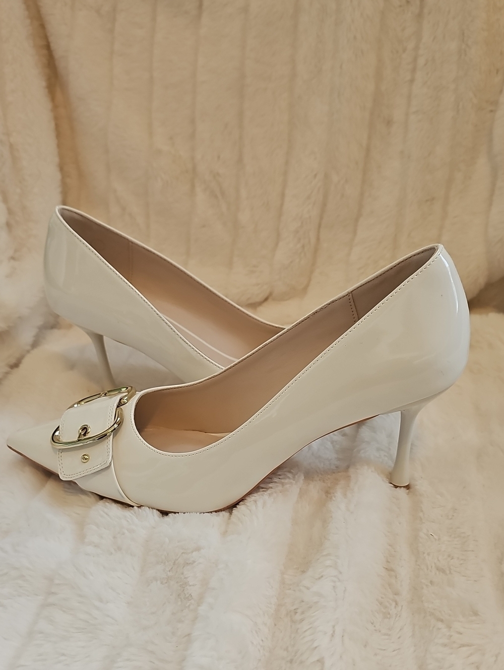 Patent Pointed-Toe Heels in Ivory with Gold Buckle